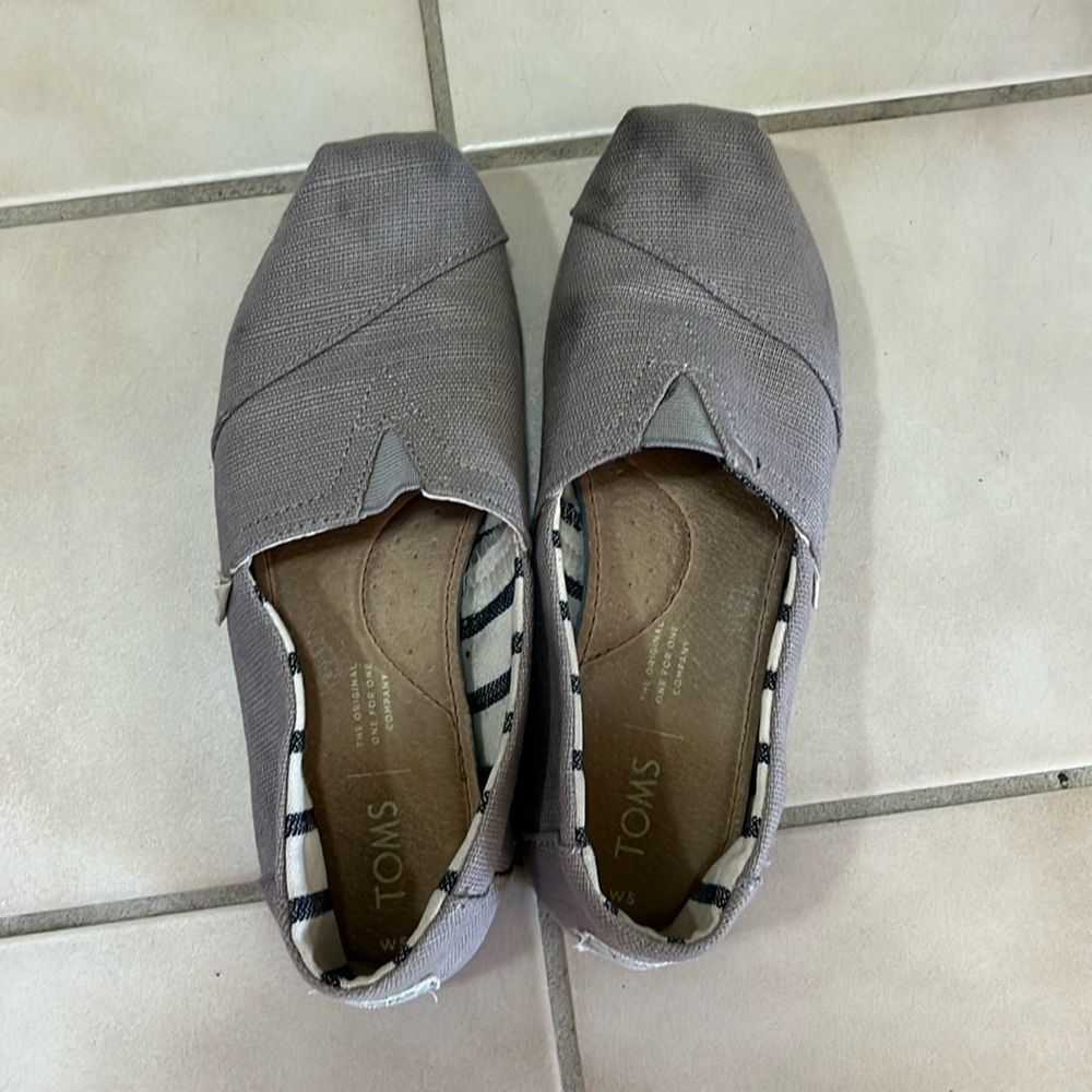 TOMS in a light grey color